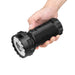 Olight Marauder 3 25,000 Lumen Flashlight  in hand